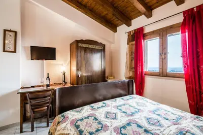 Letto o letti in una camera di Agriturismo Monte Criscione