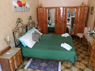 Letto o letti in una camera di Nice House wifi free bici free
