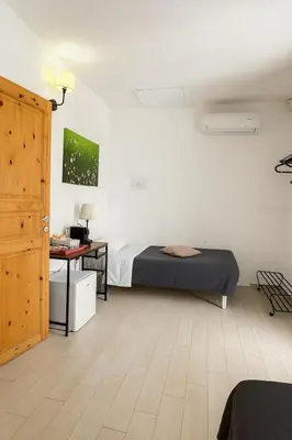 Letto o letti in una camera di Re Bafè
