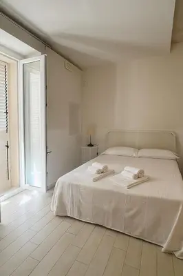 Letto o letti in una camera di Re Bafè