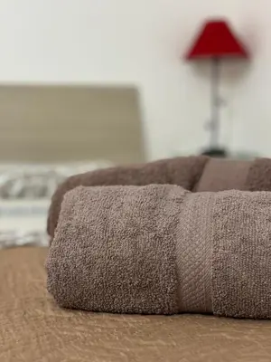 Letto o letti in una camera di Appartamento Geco Rosso