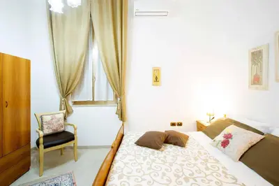 Letto o letti in una camera di Casa Francesca