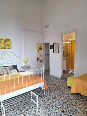 Letto o letti in una camera di B&B Perla