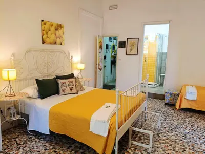 Letto o letti in una camera di B&B Perla