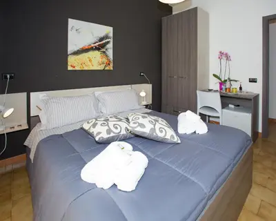 Letto o letti in una camera di B&B Albergo Sicilia City Center