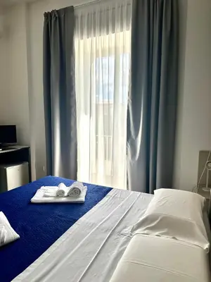 Letto o letti in una camera di B&B Albergo Sicilia City Center
