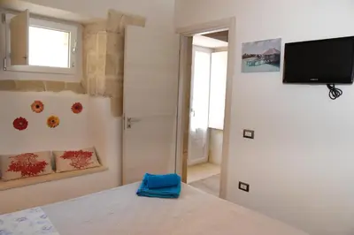 Letto o letti in una camera di CasaMia