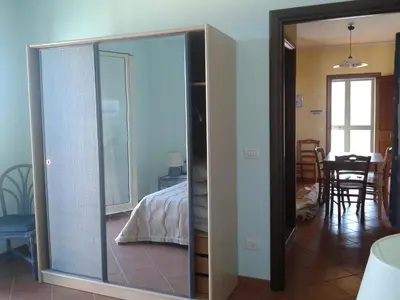 Letto o letti in una camera di Casa Mercurio