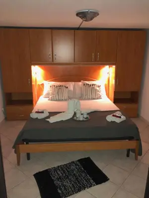 Letto o letti in una camera di Ester
