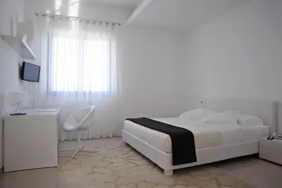 Letto o letti in una camera di Pietre Nere Resort & Spa