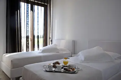 Letto o letti in una camera di Pietre Nere Resort & Spa