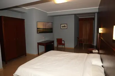 Letto o letti in una camera di Città Della Notte