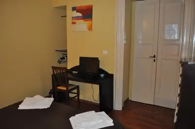 Letto o letti in una camera di B&B Teatro Bellini