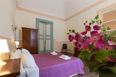 Letto o letti in una camera di B&B Teatro Bellini