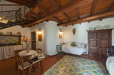 Letto o letti in una camera di Villa Dei Papiri Fonte Ciane