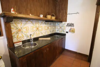 Cucina o angolo cottura di Villa Dei Papiri Fonte Ciane
