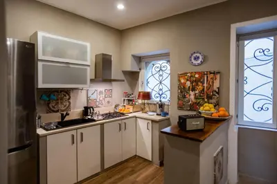 Cucina o angolo cottura di Dimora di Ulisse Sea View Holiday Apartment