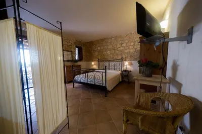 Letto o letti in una camera di Valle dell'Acanto