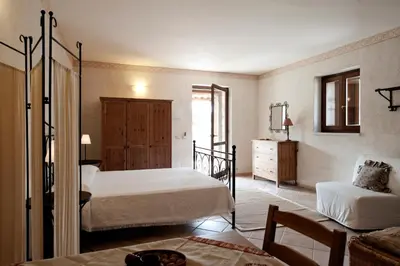 Letto o letti in una camera di Valle dell'Acanto