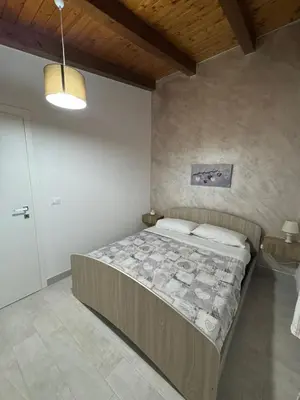 Letto o letti in una camera di Villa Dalila