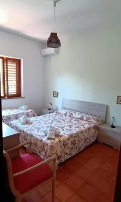 Letto o letti in una camera di Baia di Arcile, a 2 passi dal mare incantato