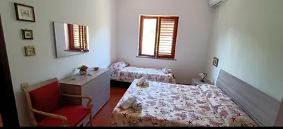 Letto o letti in una camera di Baia di Arcile, a 2 passi dal mare incantato