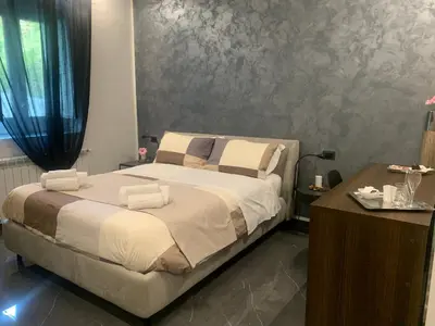 Letto o letti in una camera di B&B Agriturismo 'A Cunziria