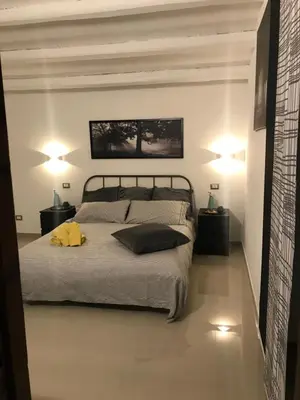 Letto o letti in una camera di B&B Agriturismo 'A Cunziria