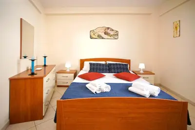 Letto o letti in una camera di Marzamemi Vacanze