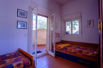 Letto o letti in una camera di Dalle Grotte al Mare