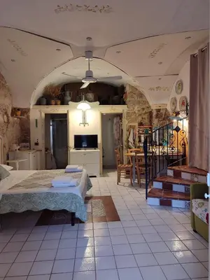 Letto o letti in una camera di Casa MaFaCò