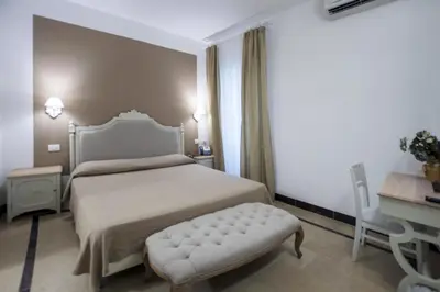Letto o letti in una camera di Hotel Gargallo