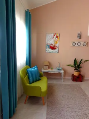 Area soggiorno di Pepe's apartment