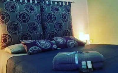 Letto o letti in una camera di O'Paisi Casa Vacanze