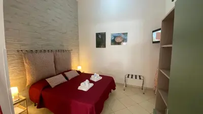 Letto o letti in una camera di O'Paisi Casa Vacanze