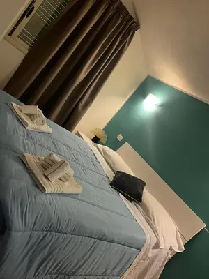 Letto o letti in una camera di Saija Resort