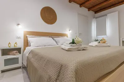 Letto o letti in una camera di Al Cortiletto