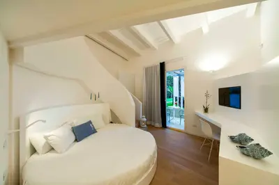 TV o dispositivi per l'intrattenimento presso Calapetra Resort