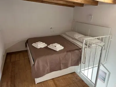 Letto o letti in una camera di Borghetto Mediterraneo