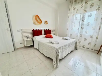 Letto o letti in una camera di San Lorenzo Holiday