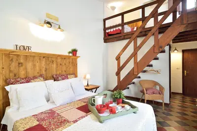Letto o letti in una camera di Case del Vicolo Stretto