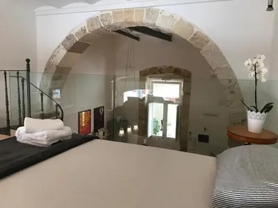 Letto o letti in una camera di Casina Trento