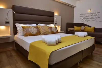 Letto o letti in una camera di Palazzo Sisto Exclusive Rooms