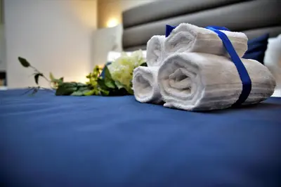 Letto o letti in una camera di Palazzo Sisto Exclusive Rooms