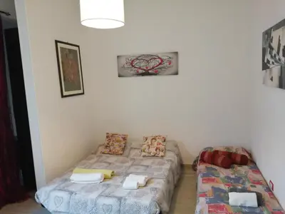 Letto o letti in una camera di Siracusa,tra ortigia e il mare