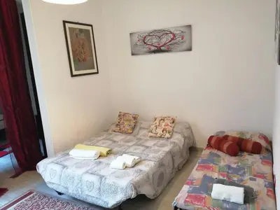 Letto o letti in una camera di Siracusa,tra ortigia e il mare