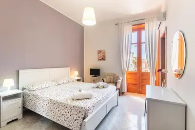 Letto o letti in una camera di Casa Mia