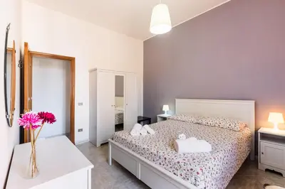 Letto o letti in una camera di Casa Mia