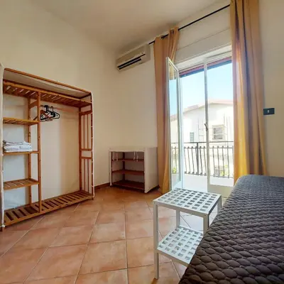 Letto o letti in una camera di Casa Deborah