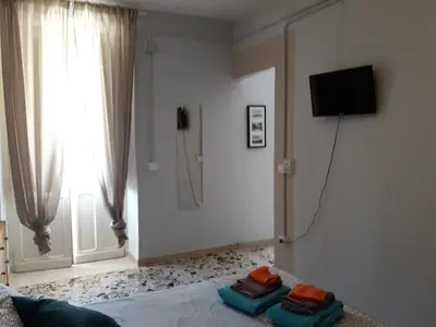 TV o dispositivi per l'intrattenimento presso Casa Adriana B&B